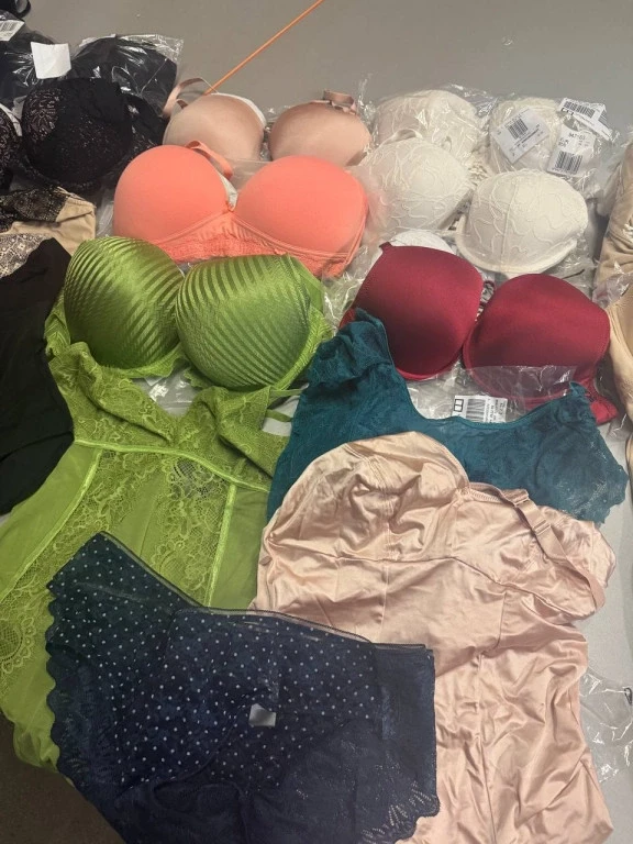 Photo Stock mix of women's underwear, swimsuits and pajamas